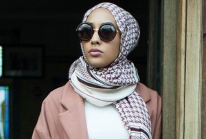 H&M advertising campaign featuring a model wearing a hijab. 